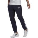 Spodnie męskie adidas Essentials Colorblock Fleece granatowe HK2884