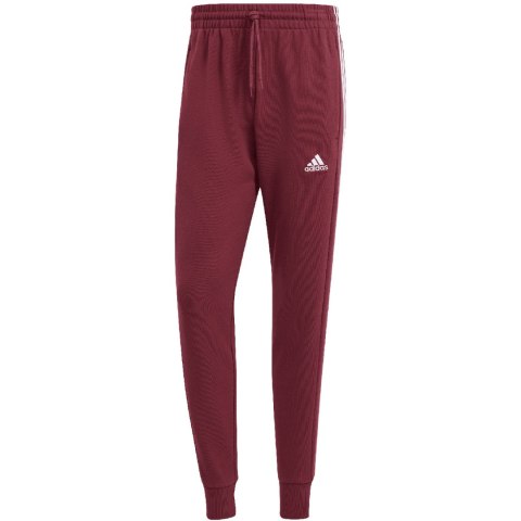 Spodnie męskie adidas Essentials French Terry Tapered Cuff 3-Stripes bordowe IS1366