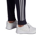 Spodnie męskie adidas Essentials Fleece Tapered Cuff 3-Band Pants granatowe GK8823