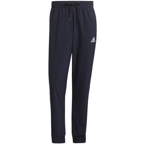 Spodnie męskie adidas Essentials Tapered Cuff 3 Stripes Pants granatowe GK8981