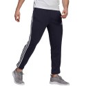 Spodnie męskie adidas Essentials Tapered Elastic Cuff 3 Stripes Pant granatowe GK8830